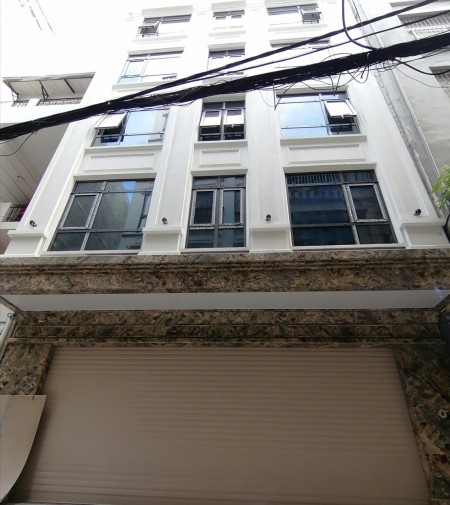 Bán toà nhà Văn Phòng Dt:250M2, 9 tầng mặt phố Nguyễn Ngọc Nại. Giá= 62tỷ