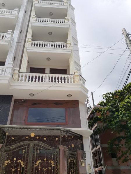 Bán nhà mặt tiền Nguyễn Đình Chính, PN, 80m2, 5 lầu thang máy 17 tỷ