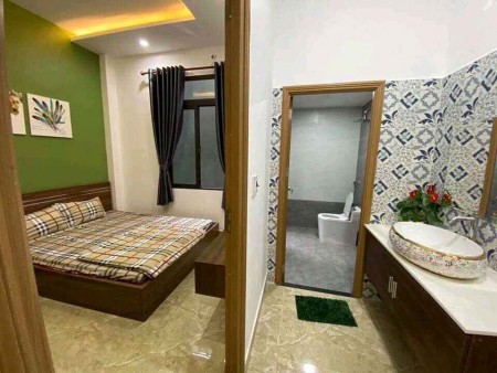 Bán căn nhà bên đường ĐOàn Nguyên Tuấn sau lưng chợ Hưng Long Bình Chánh, SHR