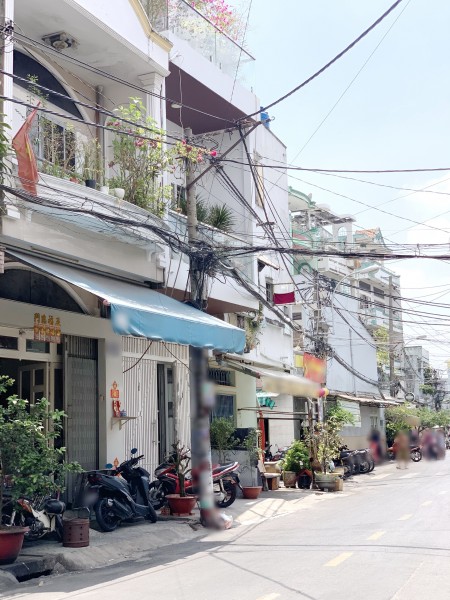 Nhà (4.5*11m/NH4.9m/Lầu) mặt tiền đường Thái Phiên P8 Q11
