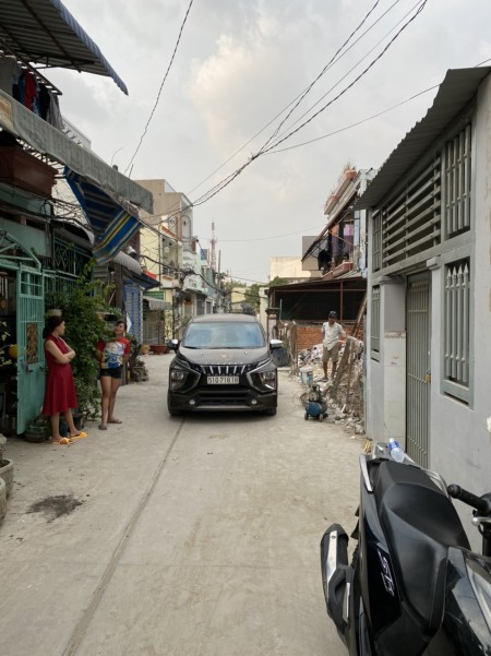 Nhà mới xây trệt + lầu xã Tân Kiên, Bình Chánh. DT 84m2, hẻm xe hơi, sổ hồng riêng.