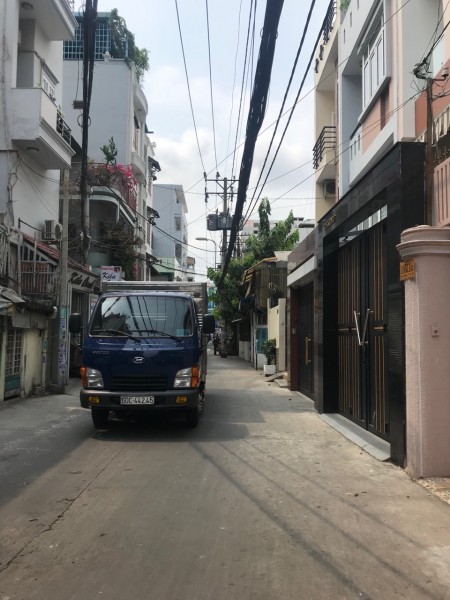 Nhà 5 tầng HXT Bạch Đằng phường 24, dt 105m2 doanh thu 75tr/tháng