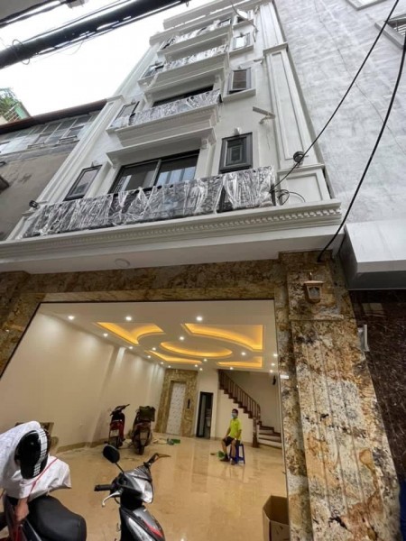 Cần bán nhà Dương Quảng Hàm khu Cầu Giấy 65m2 7 tầng mặt tiền 5,8m. Giá 13.5 tỷ