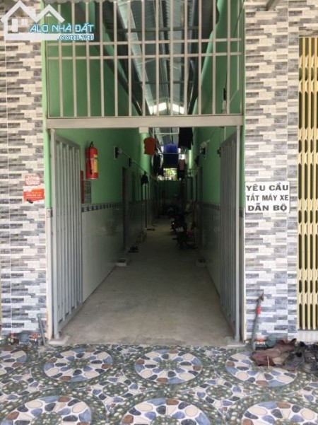 Chính chủ bán 6 phòng trọ mới đang KD cho thuê 7tr/tháng, gần chợ Hưng Long dt 130m2, đường 10m, bao sổ hồng