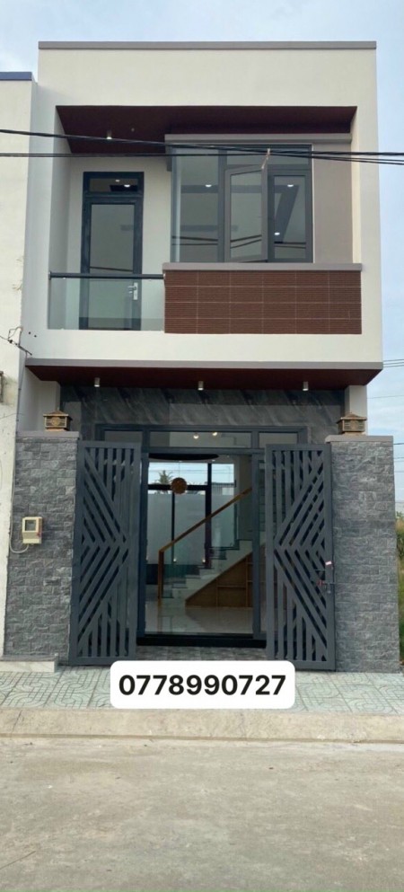 Bán căn nhà 82m2 bên đường đoàn nguyễn tuấn _ bình chánh, shr