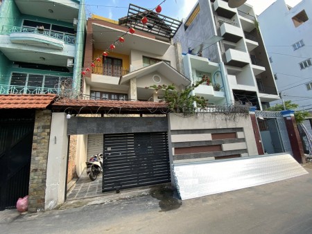 Nhà Bùi Đình Tuý diện tích. 8x20m trệt 3 lầu, sàn gỗ, gara ô tô
