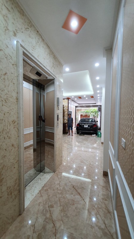 Phùng Chí Kiên dt 65m2, 7 tầng thang máu, gara ô tô, ngõ thông kinh doanh, giá 14.5 tỷ