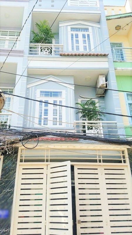 Nhà mới 1T2L, sau căn mặt tiền đường Nguyễn Văn Quá, p.Đông Hưng Thuận, Q12