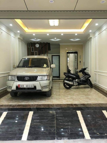 Nhà Lô Góc Thang Máy kinh doanh GaRa Ô Tô 61m, 7 tầng Đống Đa 9.45tỷ
