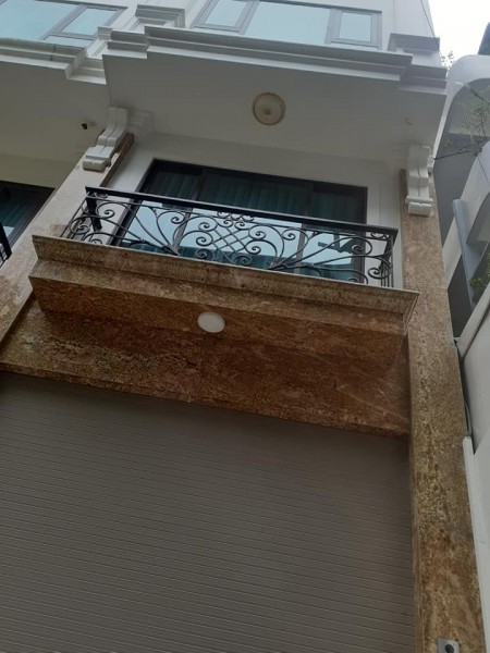 Bán Tòa Nhà 7 tầng Thang Máy, Gara Phố Tôn Đức Thắng, Đống Đa dt 50 m, Mt5 m giá 10.8 tỷ có TL