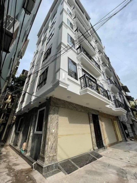 Bán nhà Phùng Chí Kiên, 7 tầng thang máy, gara dt 55m2, giá bán 14 tỷ, thương lượng