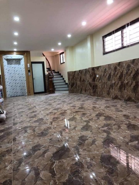 Nhà đẹp Tôn Thất Tùng dt 56m2, 7 tầng thang máy, giá 13,5 tỷ, kinh doanh ngõ oto thông lô góc
