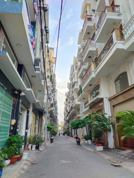 Tôi muốn bán nhà Mới vào ở ngay diện tích sử dụng 50m2, hẻm xe hơi, phường15, Tân Bình.