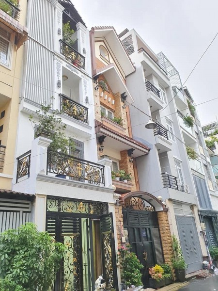 Bán gấp CHDV, 2 mặt tiền Hồ Văn Huê, diện tích 165m2 9 tầng, giá 57 tỷ, KD siêu đỉnh.