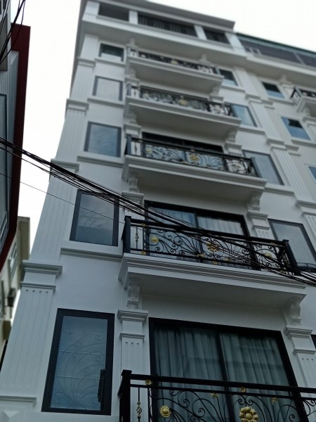Bán gấp nhà lô góc siêu đẹp Phùng Chí Kiên gara ô tô thang máy dt 66m2 giá 14,2 tỷ