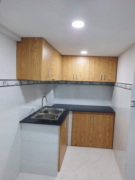 Nhà mới giá rẻ dtsd 60m2 1 trêt 2 lầu sổ hồng riêng, giá bán 2.3 tỷ, đường Lạc Long Quân, Tân Bình
