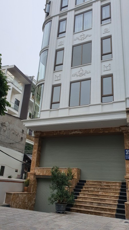 Bán Toà Vp 8 Tầng hầm, Thông sàn phố Thái Hà. Lô góc, Mt rộng 10m, Ô tô tránh. Dt 150m2 giá 39Ty