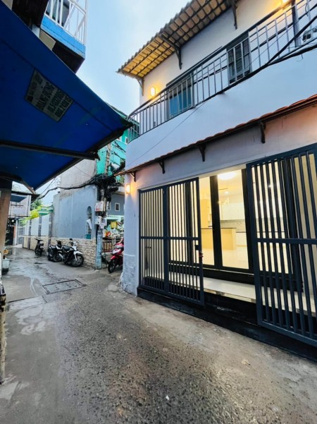 Bán nhà 2 mặt hẻm Huỳnh tấn Phát 50m2,2 tầng đúc nhà còn mới nhình 4 tỷ