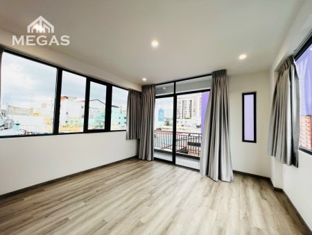 Căn hộ dịch vụ giá tốt full nội thất bancol riêng thoáng mát ngay vòng xoay Phú Lâm