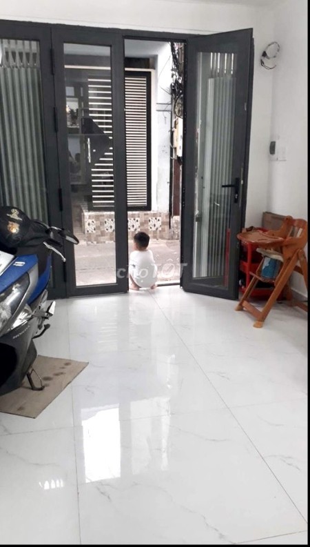 Bán nhà 2 lầu hẻm 122 Tôn Đản Quận 4 hẻm thông xe hơi 4m lh 0937423033