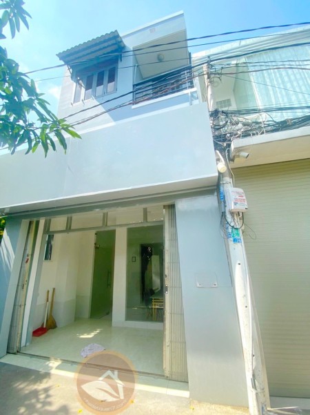 Nhà nguyên căn hẻm xe hơi cách măt tiền đường 1 căn nhà Lê Văn Lương Quận 7