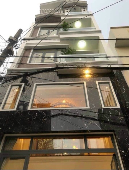 Bán nhà HXH đường Lê Trực, DT: 4,5x12, trệt + 3 lầu, CQ: sổ Hồng, giá 7,5 tỷ.
