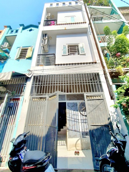 Bán nhà MT đường Sơn Cang, Phường 12, Q.Tân Bình. Dt 4x9.5m. Đúc 2 lầu 4pn, 3wc nhà còn mới ở ngay