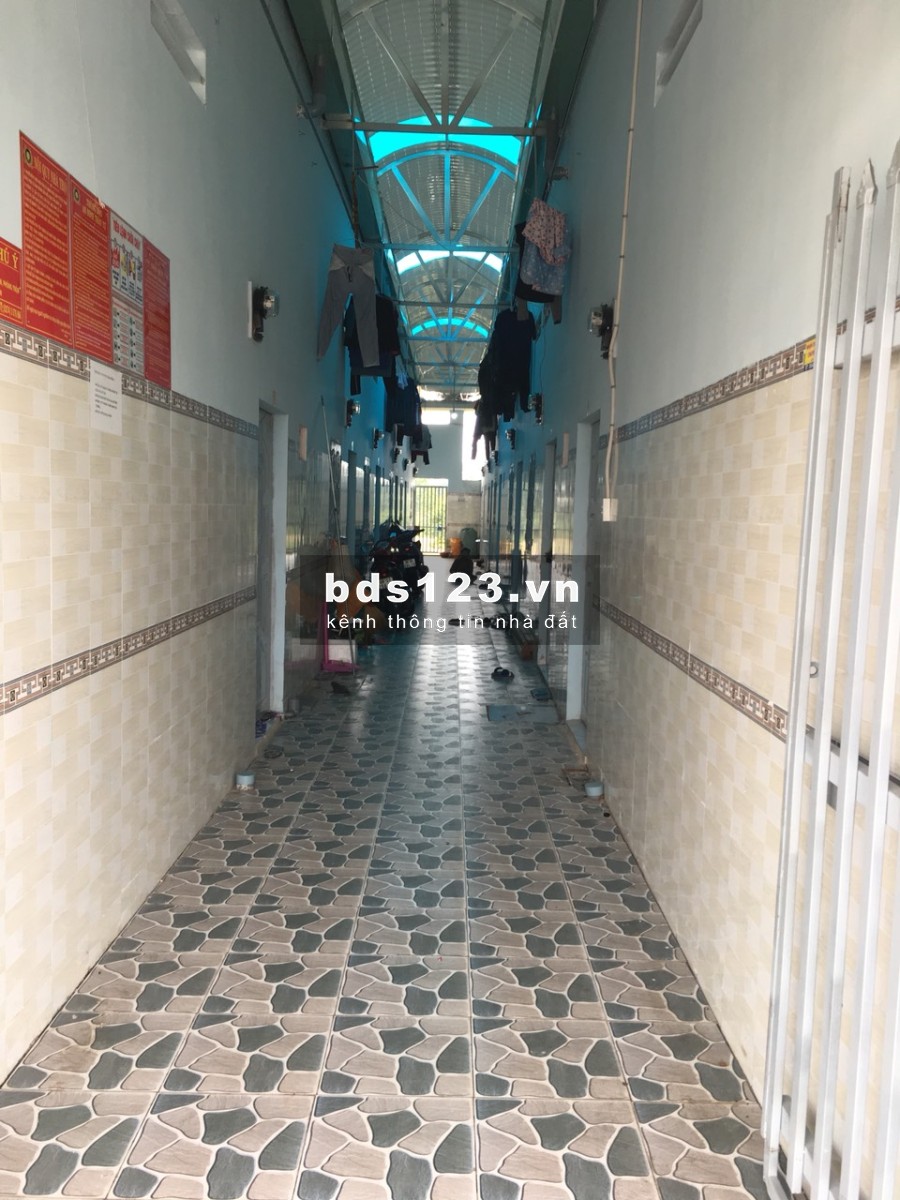 Gia đình ở xa không tiện quản lí cần bán gấp dãy nhà trọ 21 phòng + 3 kiot ở ngay Mỹ Phước 3 MT gần chợ,sát KCN,đông dân,...