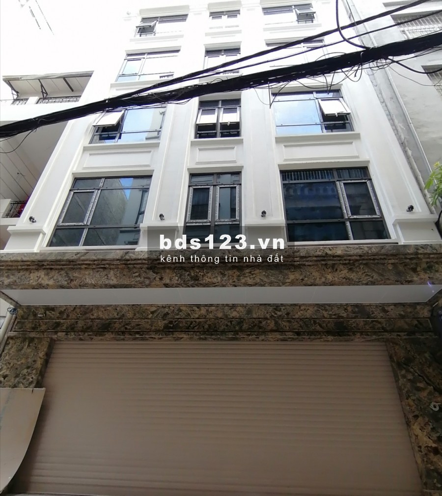 Bán toà nhà Văn Phòng Dt:250M2, 9 tầng mặt phố Nguyễn Ngọc Nại. Giá= 62tỷ