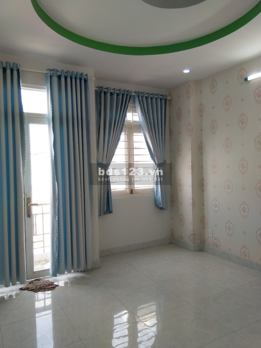 Nhà 1 trệt 2 lầu mới SHR ngay chợ đầu mối Hóc Môn