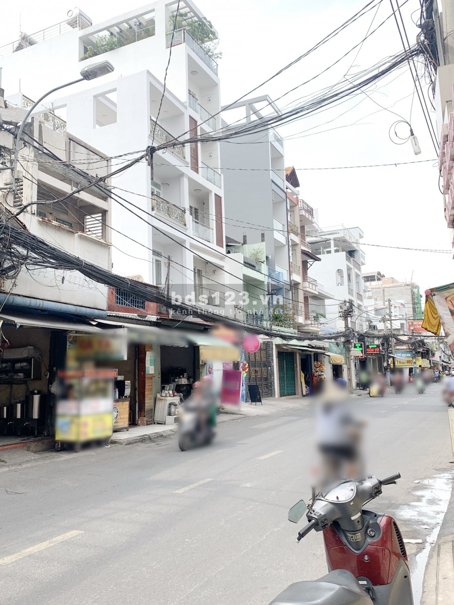 Nhà mới 3 lầu đúc, mặt tiền Lạc Long Quân P1 Q11