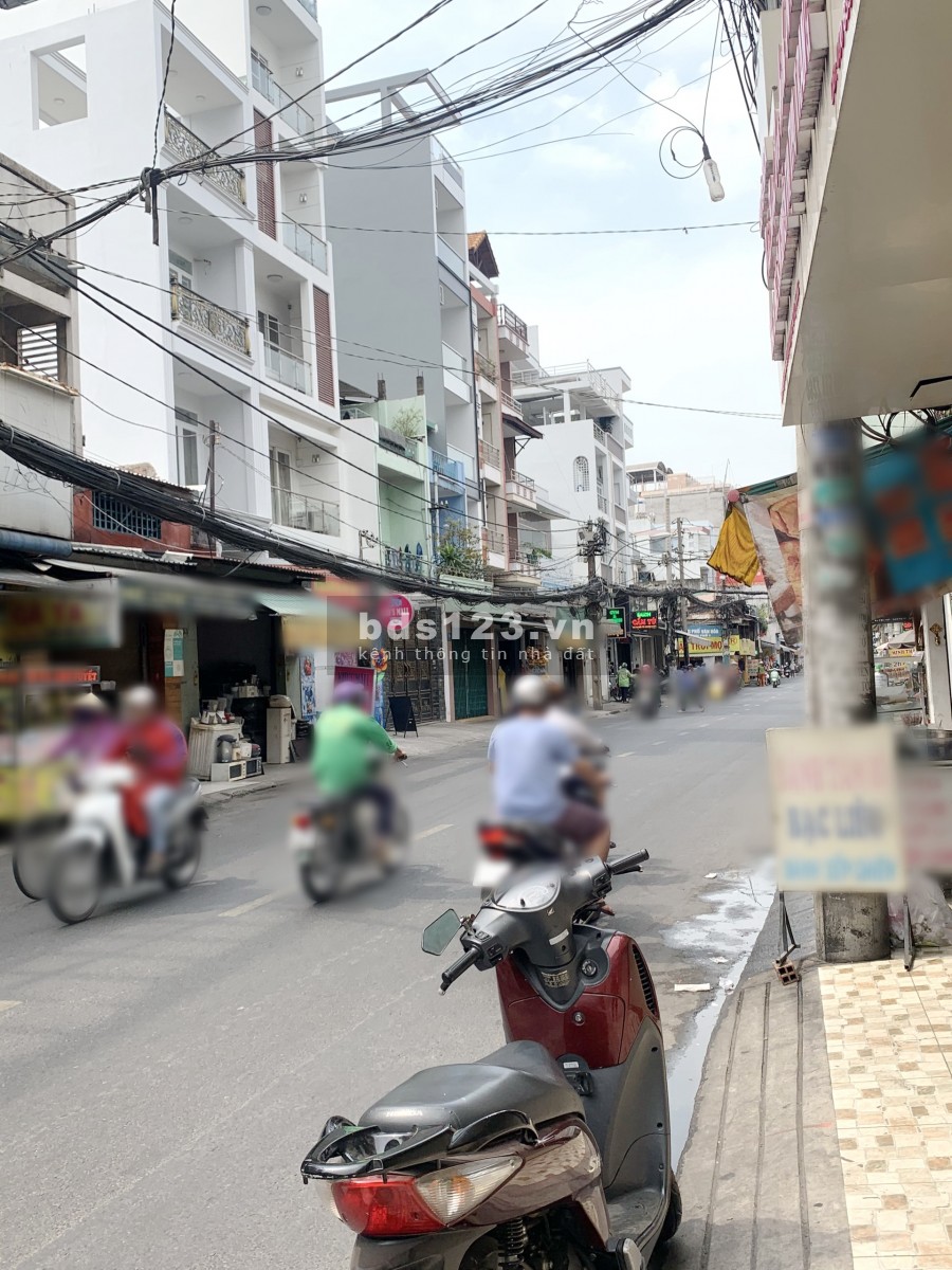 Nhà mới 3 lầu đúc, mặt tiền Lạc Long Quân P1 Q11