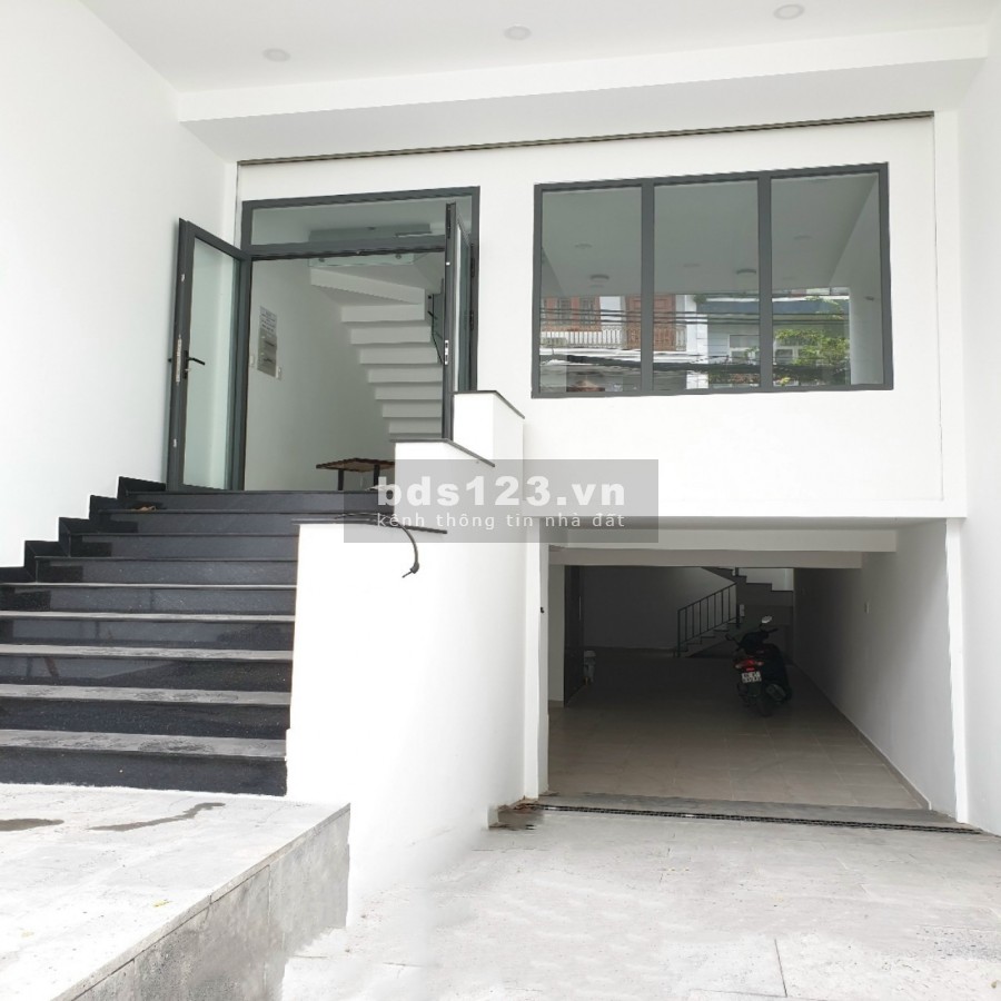 Bán nhà mặt tiền đường 25A Tân Quy 5x19 4 tầng thang máy