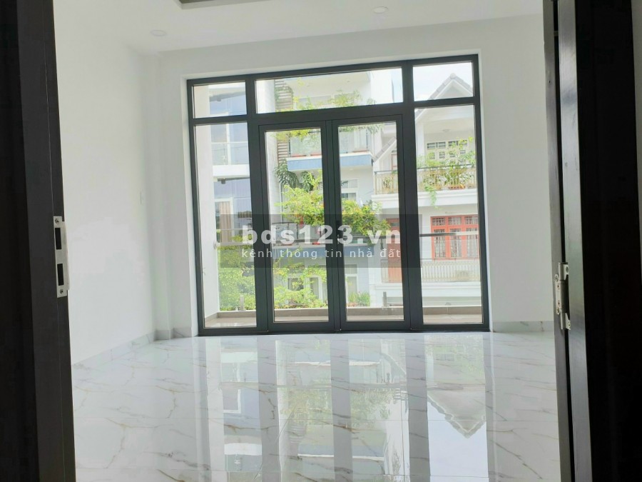 Bán nhà mặt tiền đường 25A Tân Quy 5x19 4 tầng thang máy