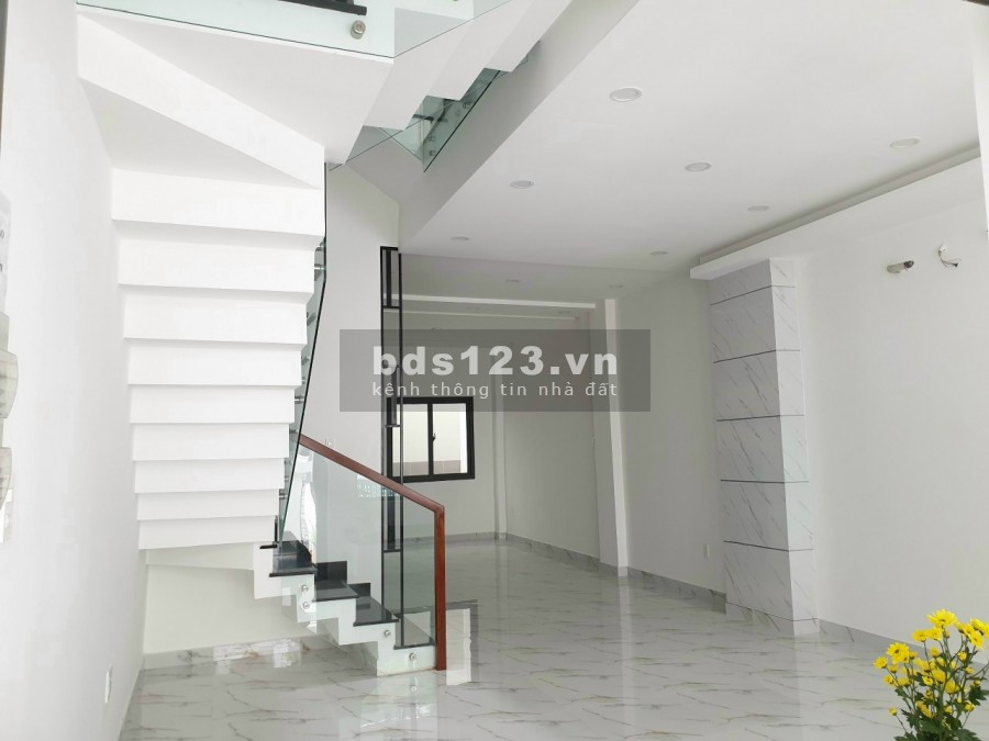 Bán nhà mặt tiền đường 25A Tân Quy 5x19 4 tầng thang máy