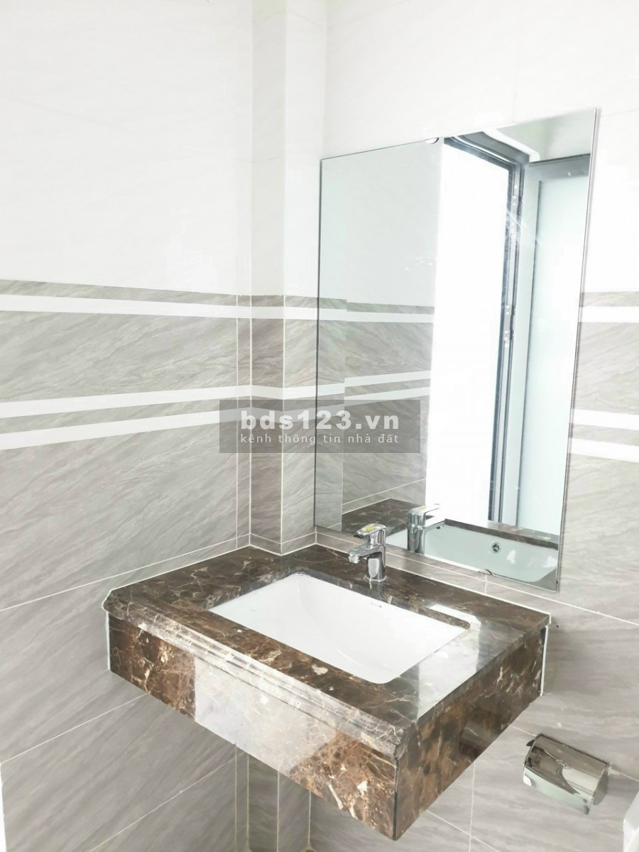 Bán nhà mặt tiền đường 25A Tân Quy 5x19 4 tầng thang máy