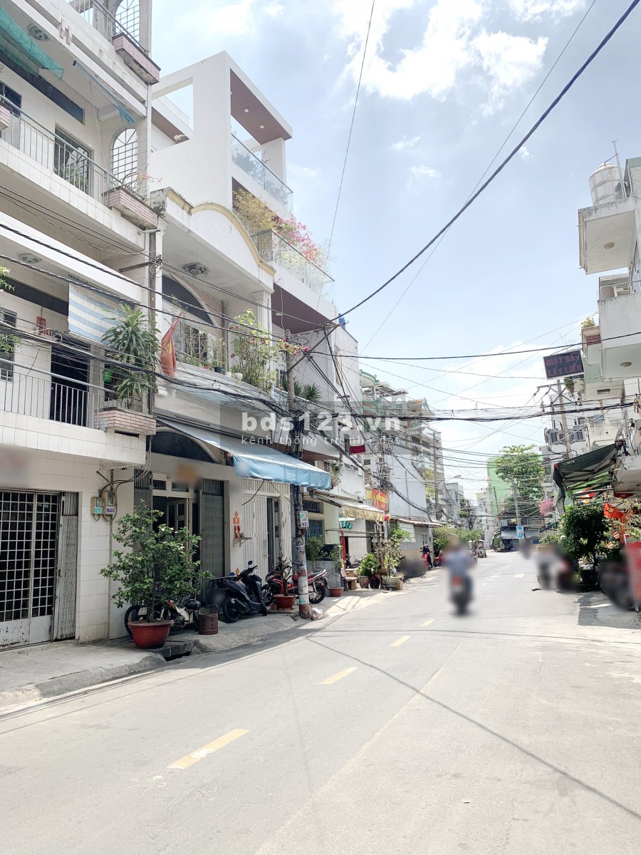 Nhà (4.5*11m/NH4.9m/Lầu) mặt tiền đường Thái Phiên P8 Q11