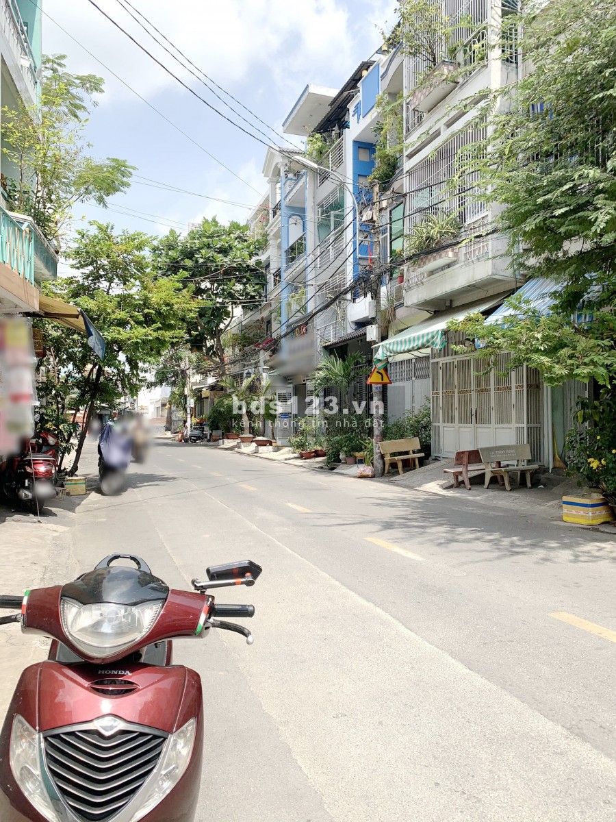 Nhà (4.5*11m/NH4.9m/Lầu) mặt tiền đường Thái Phiên P8 Q11