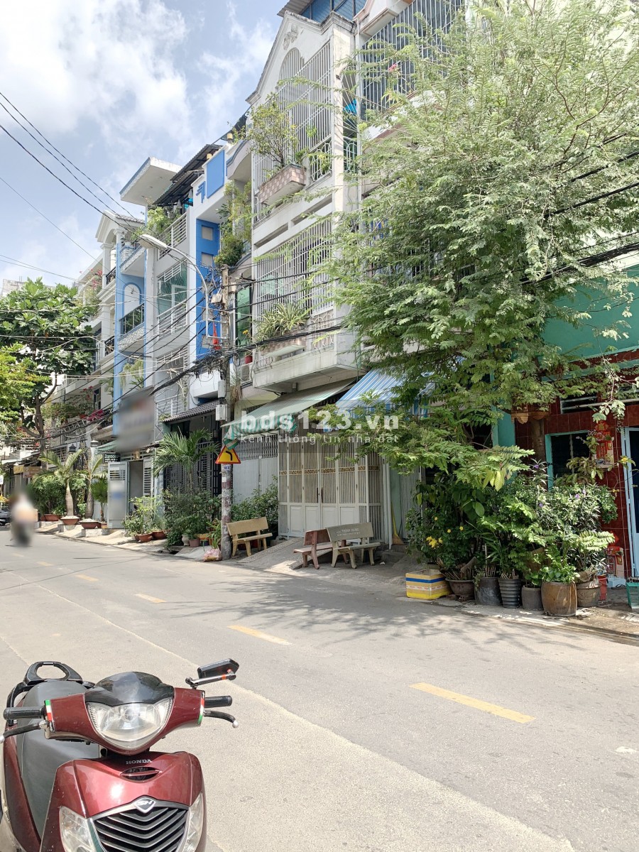 Nhà (4.5*11m/NH4.9m/Lầu) mặt tiền đường Thái Phiên P8 Q11