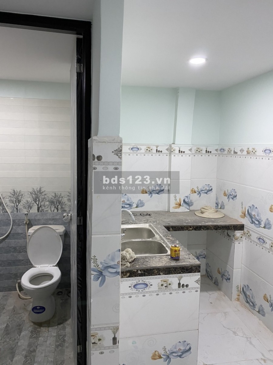 Nhà mới xây trệt + lầu xã Tân Kiên, Bình Chánh. DT 84m2, hẻm xe hơi, sổ hồng riêng.