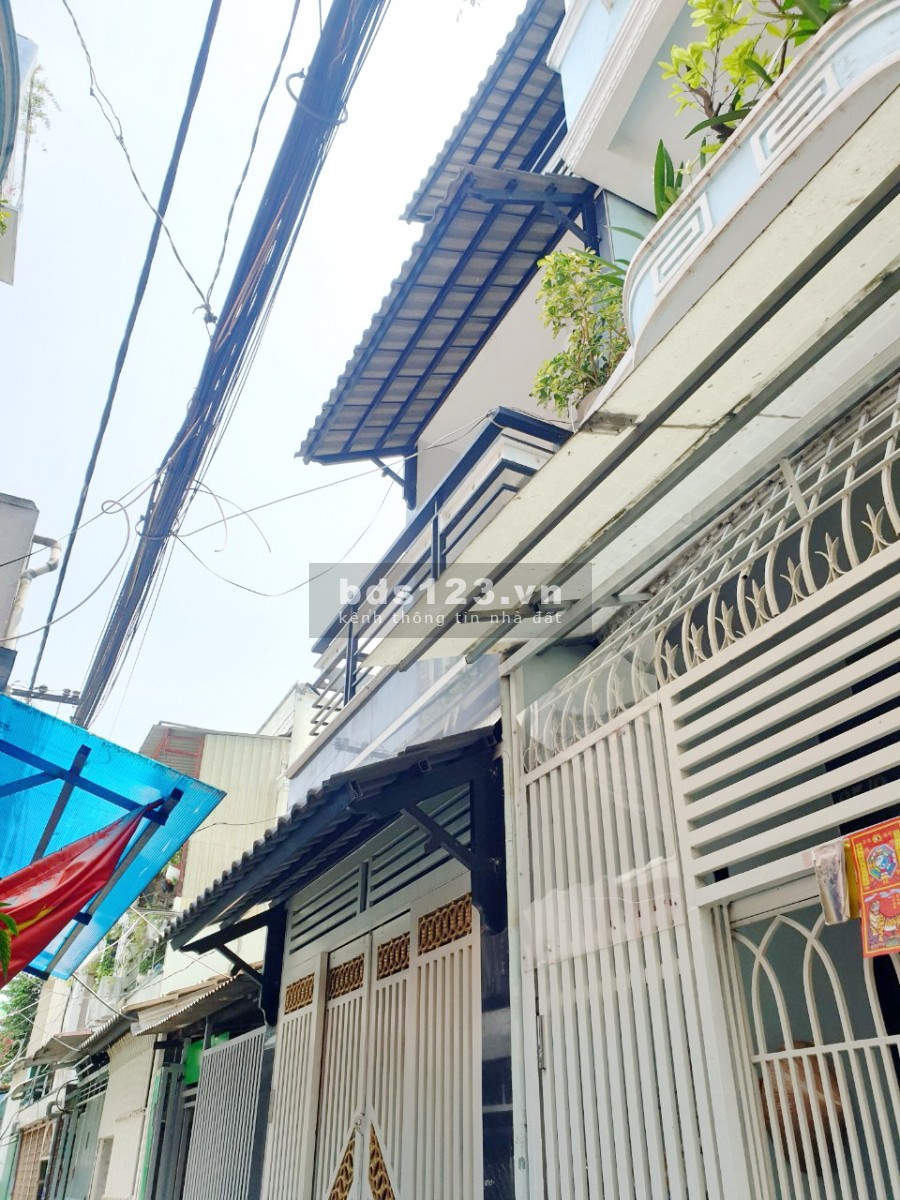 Nhà (2lầu/ST/nở hậu) hẻm 65 Bùi Huy Bích P13 Q8