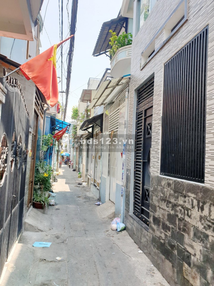 Nhà (2lầu/ST/nở hậu) hẻm 65 Bùi Huy Bích P13 Q8