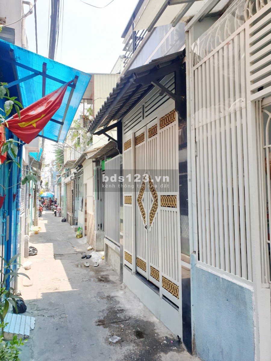 Nhà (2lầu/ST/nở hậu) hẻm 65 Bùi Huy Bích P13 Q8