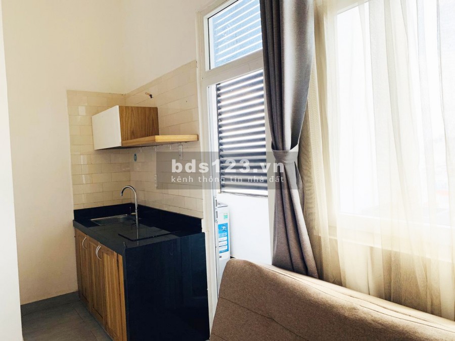 Cho thuê Chung Cư Mini gác lửng Nội Thất Gỗ cửa sổ mát mẻ có máy giặt riêng quận 7