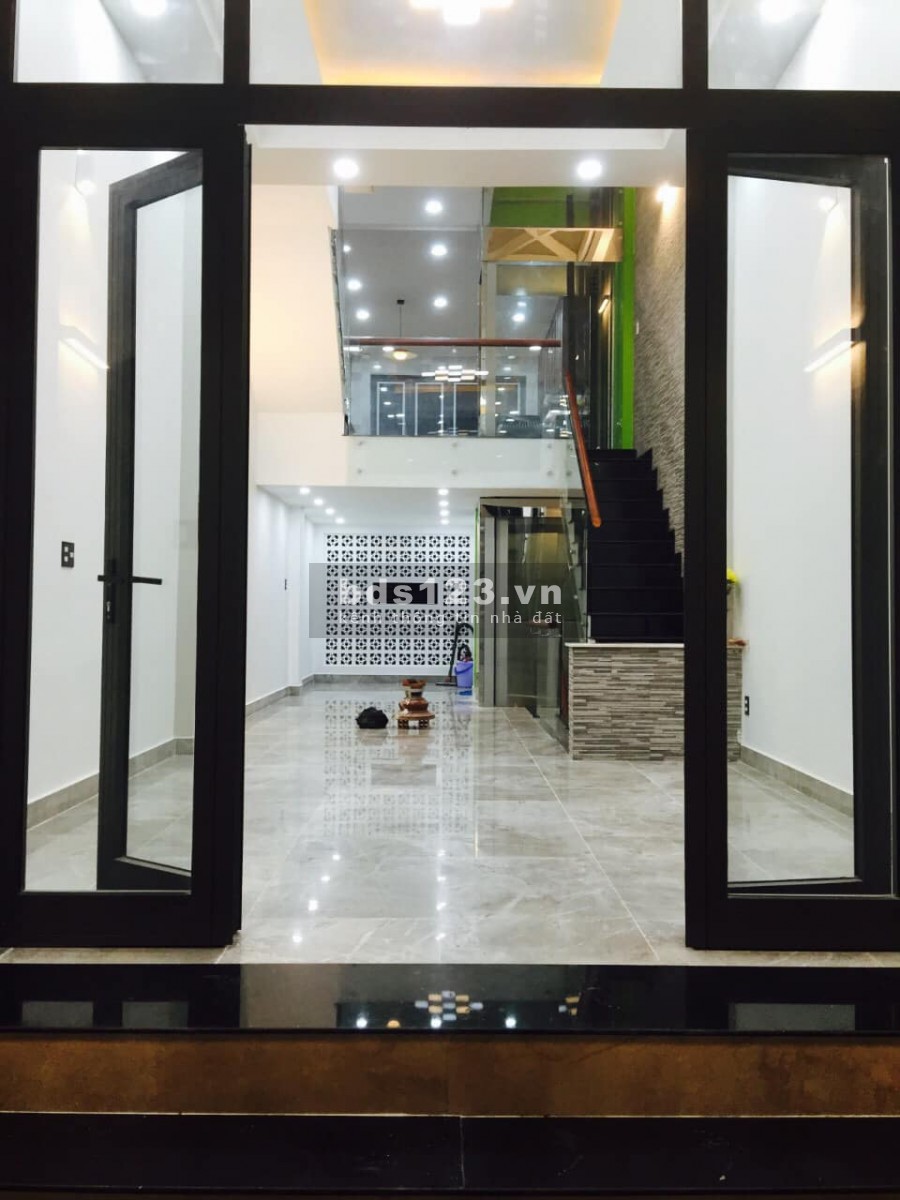 Quận 6 Nhà 2 Mặt Tiền có thang máy hầm để xe hơi Gía 17.6 Tỷ