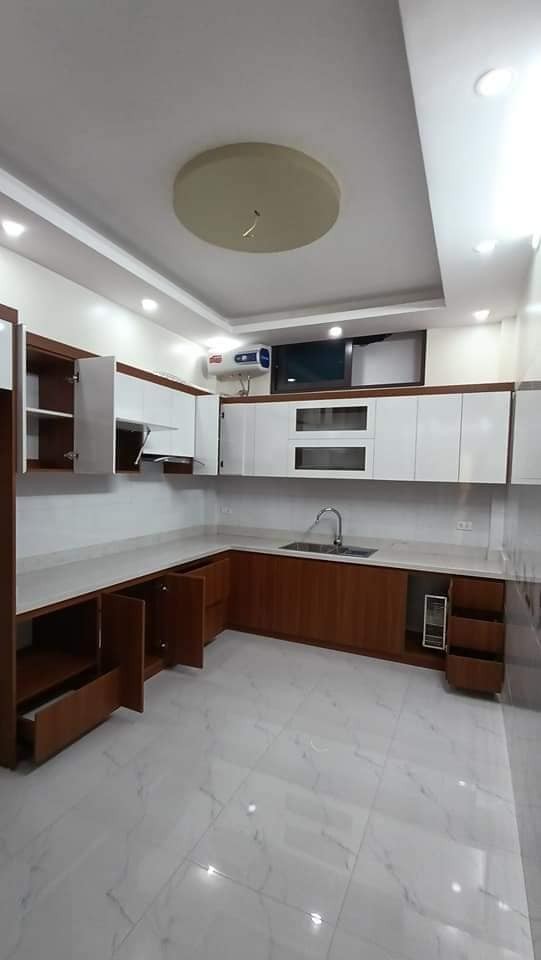Bán nhà Tây Sơn 5 tầng xây mới 45m oto đỗ cửa 10m giá 6.4 tỷ