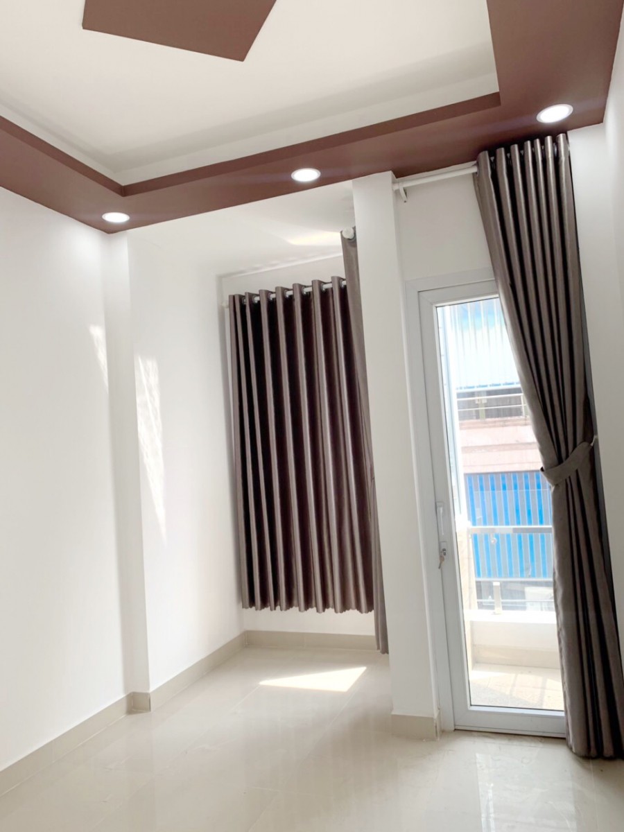 Nhà đẹp 2 lầu, ST, hẻm xe hơi đường Đặng Chất P2 Q8