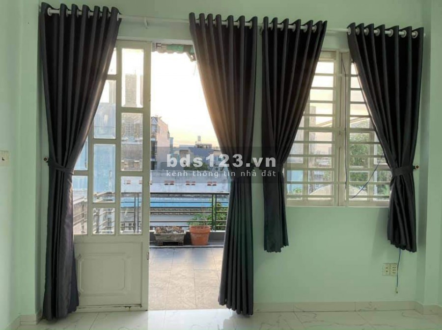 Cho thuê nhà 1 Trệt + 2 Lầu 4 PN hẻm xe hơi cạnh KCX Tân Thuận