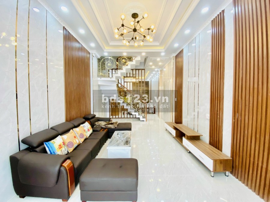 Bán nhà mới xây đường Hiệp Bình, cách ngã 4 Hiệp Bình - Phạm Văn Đồng 100m. nhà trệt + 2 lầu + tum gồm sân để xe hơi 22m2