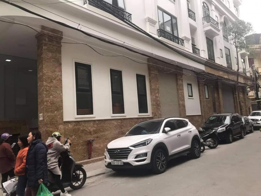 Bán toà Văn Phòng Trung Kính 90M2 x 7 tầng, MT 6m, thuê 100tr/th, lô góc, ô tô, tháng máy.